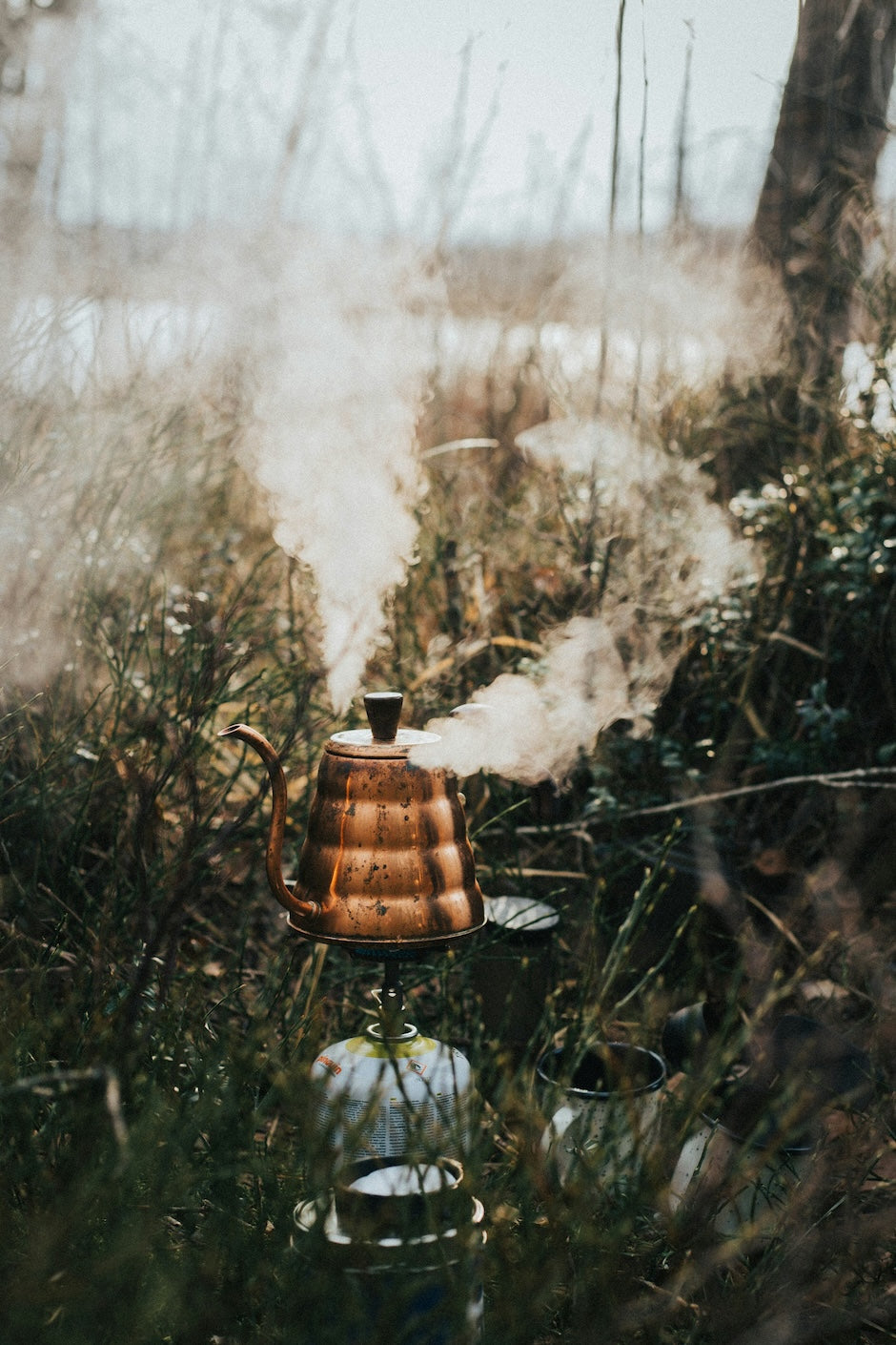 boiling water for decaf coffee in the outdoors