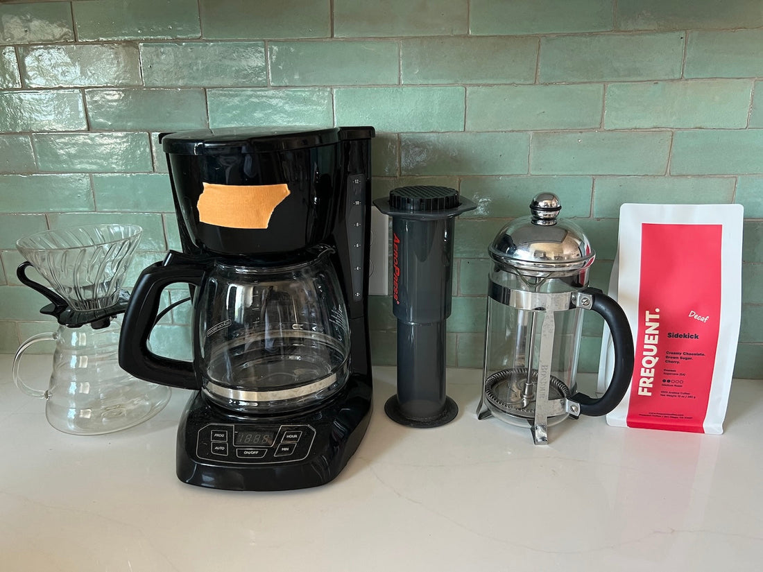 row of coffee makers for decaffeinated coffee experiment