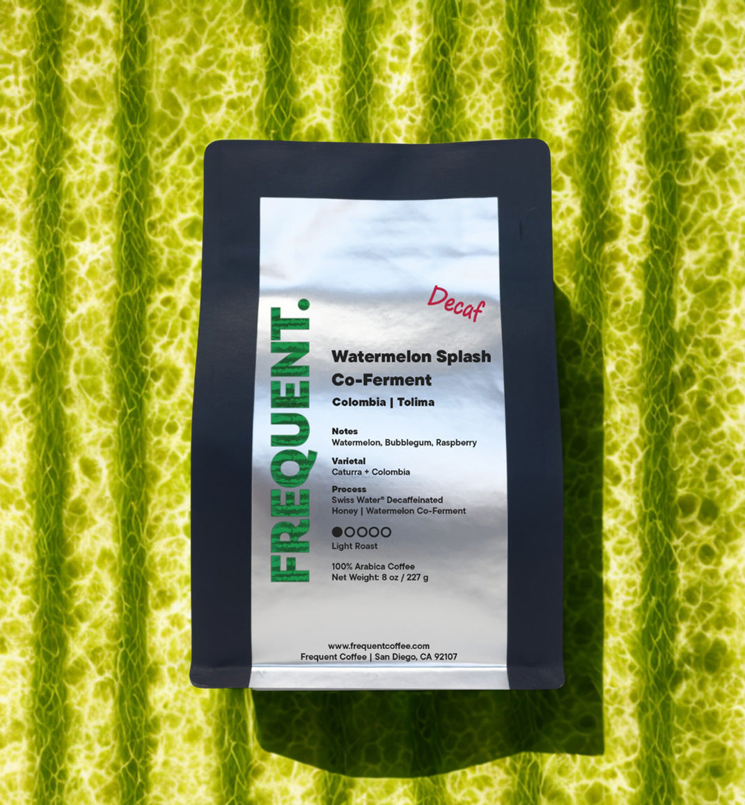 Frequent Coffee Co. watermelon splash coffee package on a green textured background