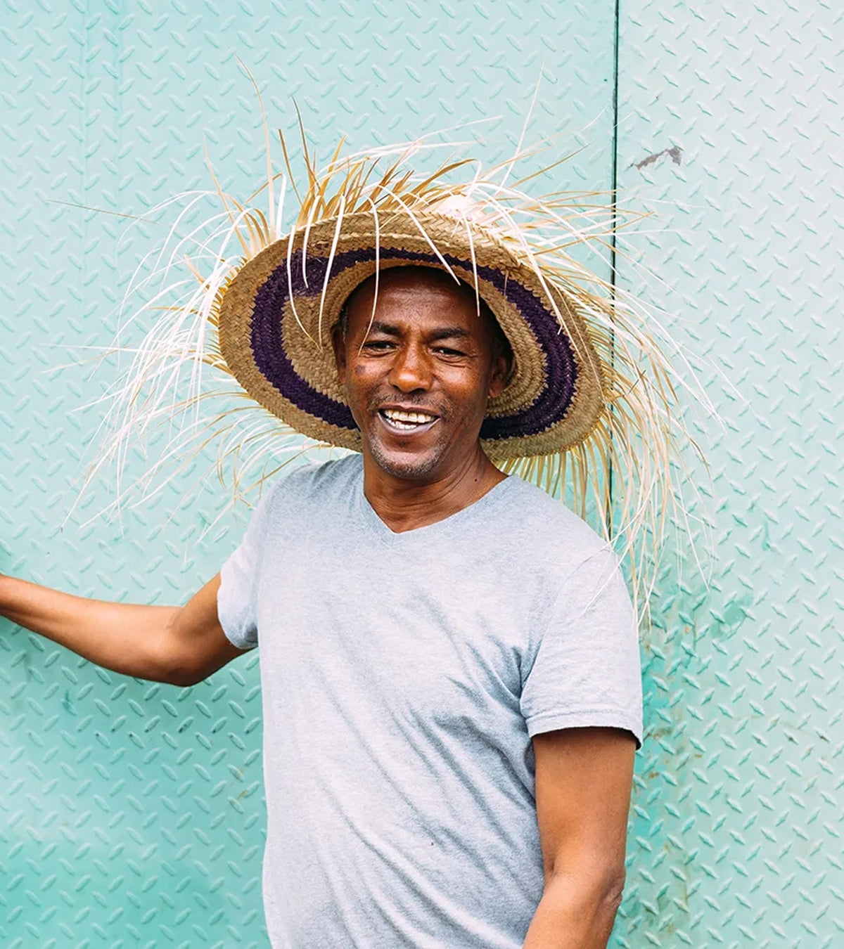 Tesfaye Bekele wearing a hat